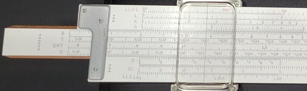 Figure 3 — The left end of my 4081-3 with the slide drawn out: the serial number 640904 is printed vertically on the slide end, and "904" on both the upper and lower stocks beside the scale names LL01, L, K, …