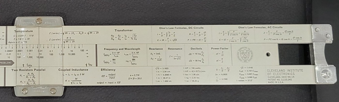Figure 4 — The right half of the back of my N-515-T, with panels headed Temperature, Transformer, Ohm's Law Formulas DC Circuits, Ohm's Law Formulas AC Circuits, Frequency and Wavelength, Reactance, Resonance…